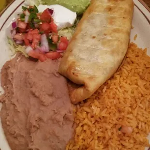 Chimichanga, cheese sauce on the side
