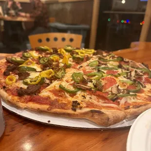 Large pizza split different toppings on each side