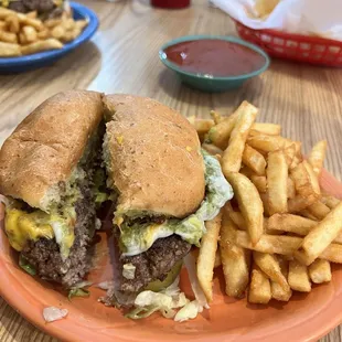 a burger and fries on a plate