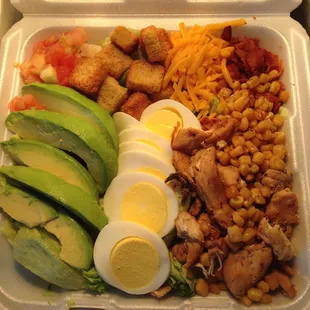 a meal in a styrofoam container