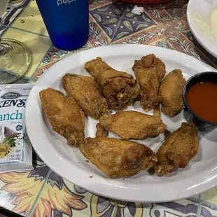 Fried wings with Franks hot sauce on the side