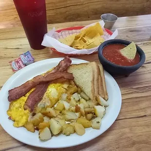 Breakfast at Miguel'. Spanish Omelet plate with bacon.  Excellent.