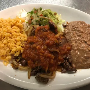 Bistek Ranchero. Beef steak sautéed with onions and topped with our ranchero sauce.