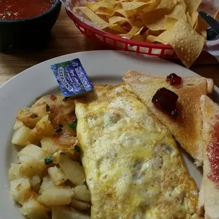 For breakfast. Spanish omelet plate. Chips &amp; salsa.  Very good been coming since high school days.
