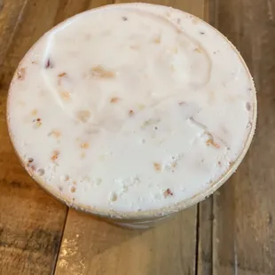 Coconut Truffle (v)(gf)(tree nuts) coco ice cream, vegan white choco shards, toasted almonds/coconuts
