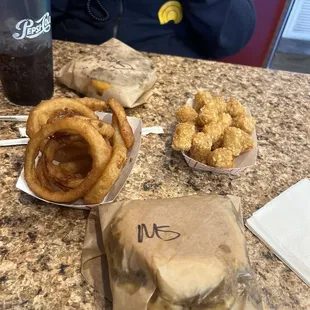 Mushroom Swiss burger and onion rings