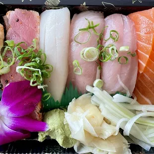 My nigiri sushi (from right: salmon, yellowtail, super white tuna, black pepper tuna and scallop)