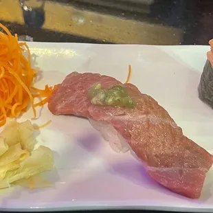 Toro (literally melted on my tongue) and scallops sushi