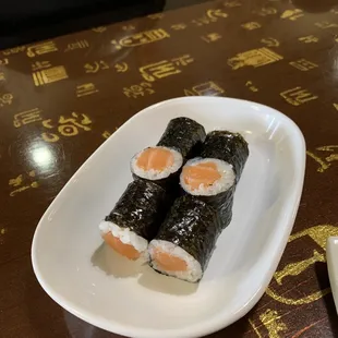 Salmon roll. Notice that There&apos;s more salmon than rice. Thumbs up!