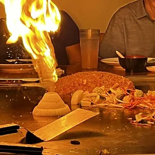 a fire coming out of the grill