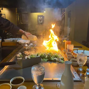 a man grilling food