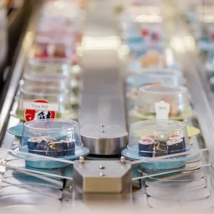 the conveyor belt of a restaurant