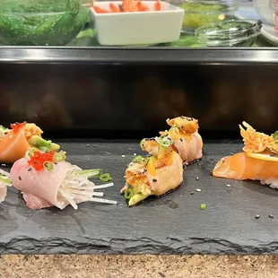 Special nigiris! Salmon lover, Medusa, tuna wraps, and rooster salmon.