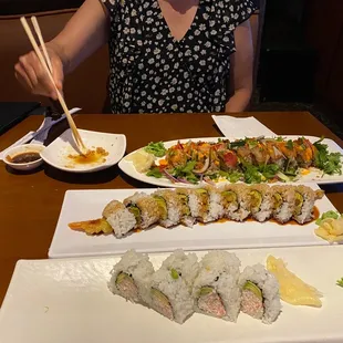a woman eating sushi