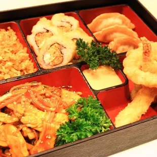 a bento box of food