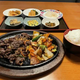 Bulgogi with ban chan. Back right ban chan is the thinly sliced radish mentioned in my review.