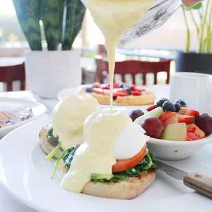 a plate of food with eggs and fruit