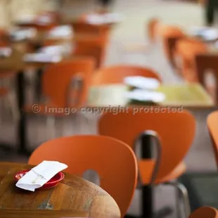 tables and chairs in a restaurant