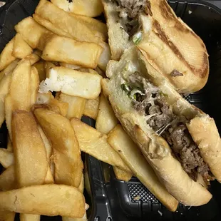 Steak and cheese with fries. after taking a bite to confirm what I was seeing