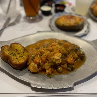 The guitreau overcooked and not flavorful. Stuffed potatoe was good. Garlic bread was underwhelming