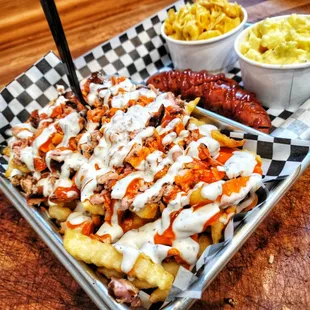 a tray of fries and coleslaw