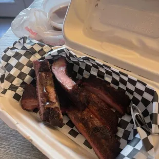 ribs in a styrofoam container