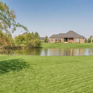 a view of a lake and a house