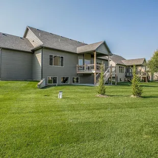 a view of the back of the house from the lawn
