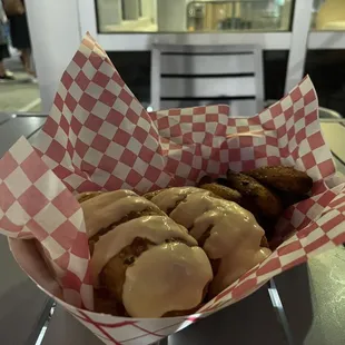 Beef empanadas with plantains, pink sauce on top 10/10 I ate everything and almost got more.