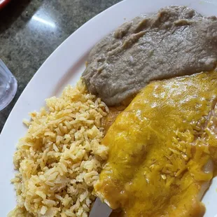 Mexican Plate with cheese quesadilla and a puffy taco