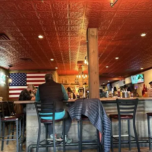 a man sitting at a bar