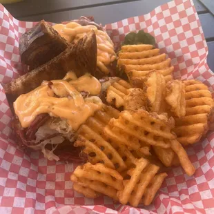 Reuben and waffle fries