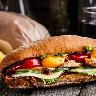 a closeup of a sandwich and french fries