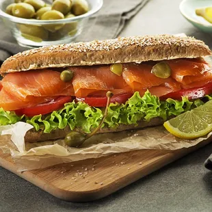a sandwich with salmon and lettuce