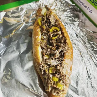 a hot dog on tin foil
