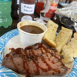 Tri tip with mikes secret sauce drizzled a couple slices of garlic bread and the always scrumptious beans