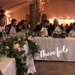 Our groomsmen enjoying the food at our reception.