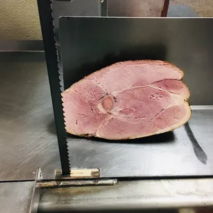 a ham being cut in half