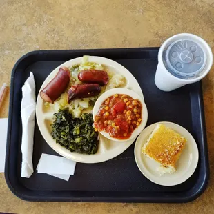 Sausage and cabbage, collards, succotash, and corn bread.