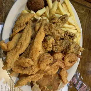 Large Seafood Platter!   I wish the hush puppies were not burnt and oily.  Offer less fries and offer a bowl of gumbo!!