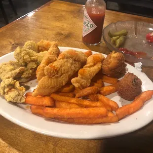 Seafood Platter (Fried Oysters, fried Catfish, sweet potato fries and Hushpuppies) unlimited All U Can Eat Salad Bar and sweet tea