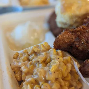 a plate of food with macaroni and cheese