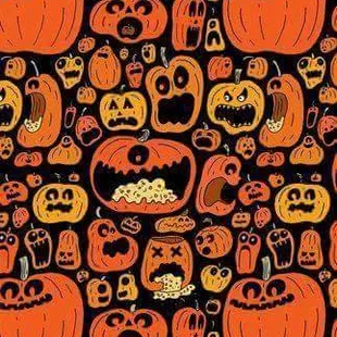 a pattern of pumpkins and cats