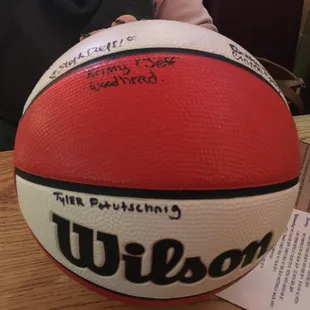 a red and white basketball