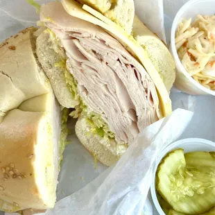 Turkey, provolone, sesame bagel. Side of slaw and pickles come with the sandwich.
