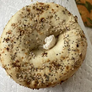On the porch with Lox Spread on a Bagel. I always pick up a dozen bagels and  Lox Spread by the 1/4 lb. when we're in Concord.