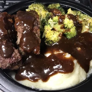 Meatloaf broccoli and mashed potatoes