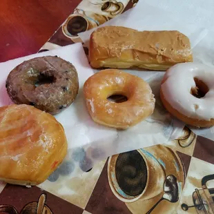 Strawberry filled, blueberry cake, glazed, caramel cream filled, and vanilla glazed cake