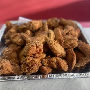 a tray of fried chicken