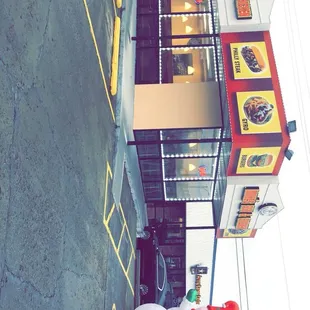 a snowman in front of a restaurant